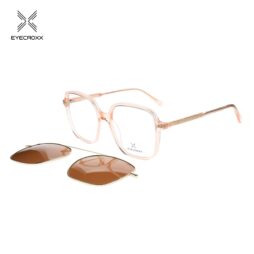 Acetate crystal light brown frame with assorted color transparent acetate temples. Gold tone metallic clip on with brown polarized lens