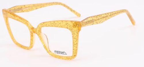 An oversized, feminine, shimmering yellow frame, with matching color temples