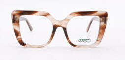 An oversized, feminine, brown frame, with matching color temples