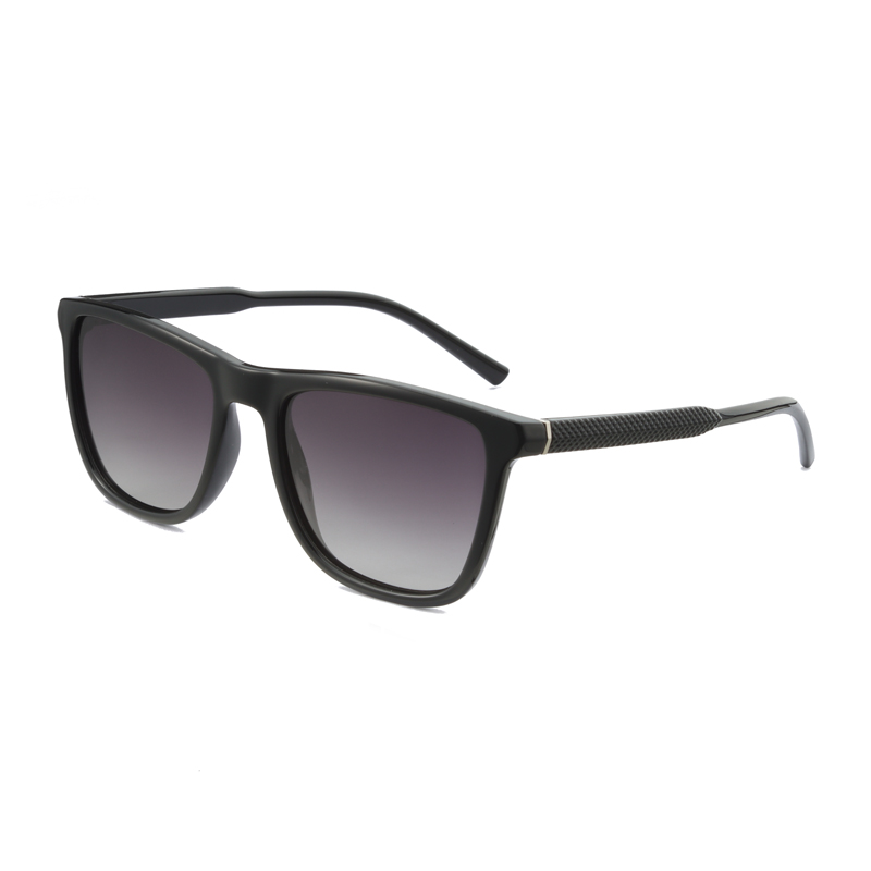 Men's, shiny black frame with rubber, matching color temples and gradient grey polarized lenses for 100% UV protection