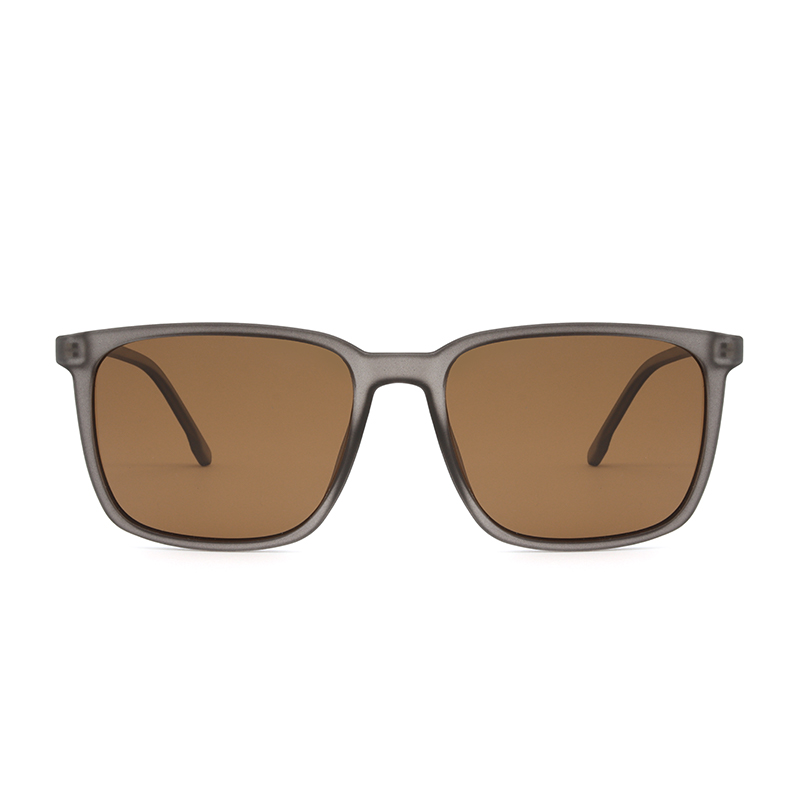 Men's, transparent grey frame and temples with side metallic detail. Brown polarized lenses for 100% UV protection