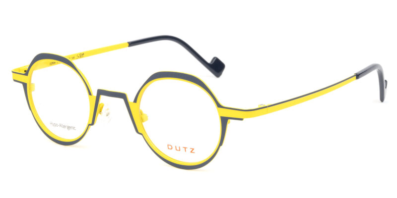 Unisex, bi-color, dark blue combined with yellow, metallic frame and temples. Matching color acetate temple tips