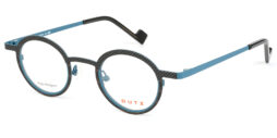 Unisex, bi-color, petrol-cabon texture, metallic frame and temples, with wood imitation details. Matching color acetate temple tips