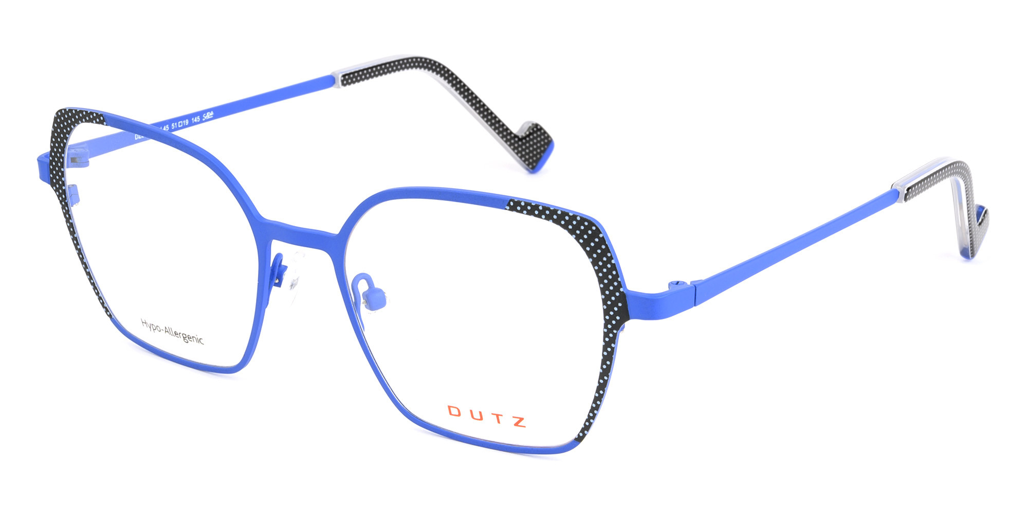 Lady's, blue based, metallic frame and temples, enhanced by a black & white dot pattern on the front and on the acetate tips