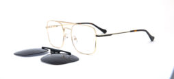 Updated, metallic frame and temples in gold color with black color details, accompanied by a smoke grey polarized mask