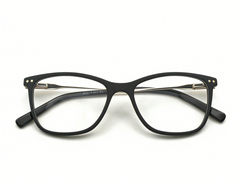 Lady's, mat black frame with gold metallic temples and black temple tips. Assorted color clip on with smoke grey polarized lenses.