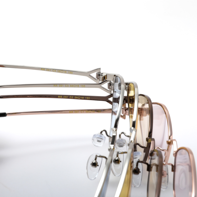 Trendy, silver tone, metallic frame and temples, with transparent blue polarized lenses for 100% UV protection.