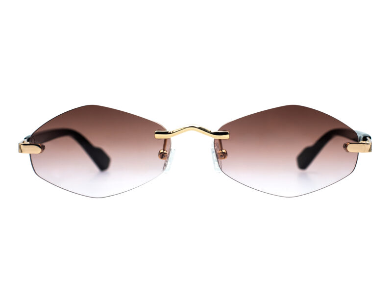 Unisex, rimless frame with gold tone metallic temples and bridge and gradient brown lenses. Black acetate temples tips