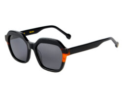 Trendy, bold, shiny black, acetate frame and temples with brown tartaruga color details and smoke grey polarized lenses.